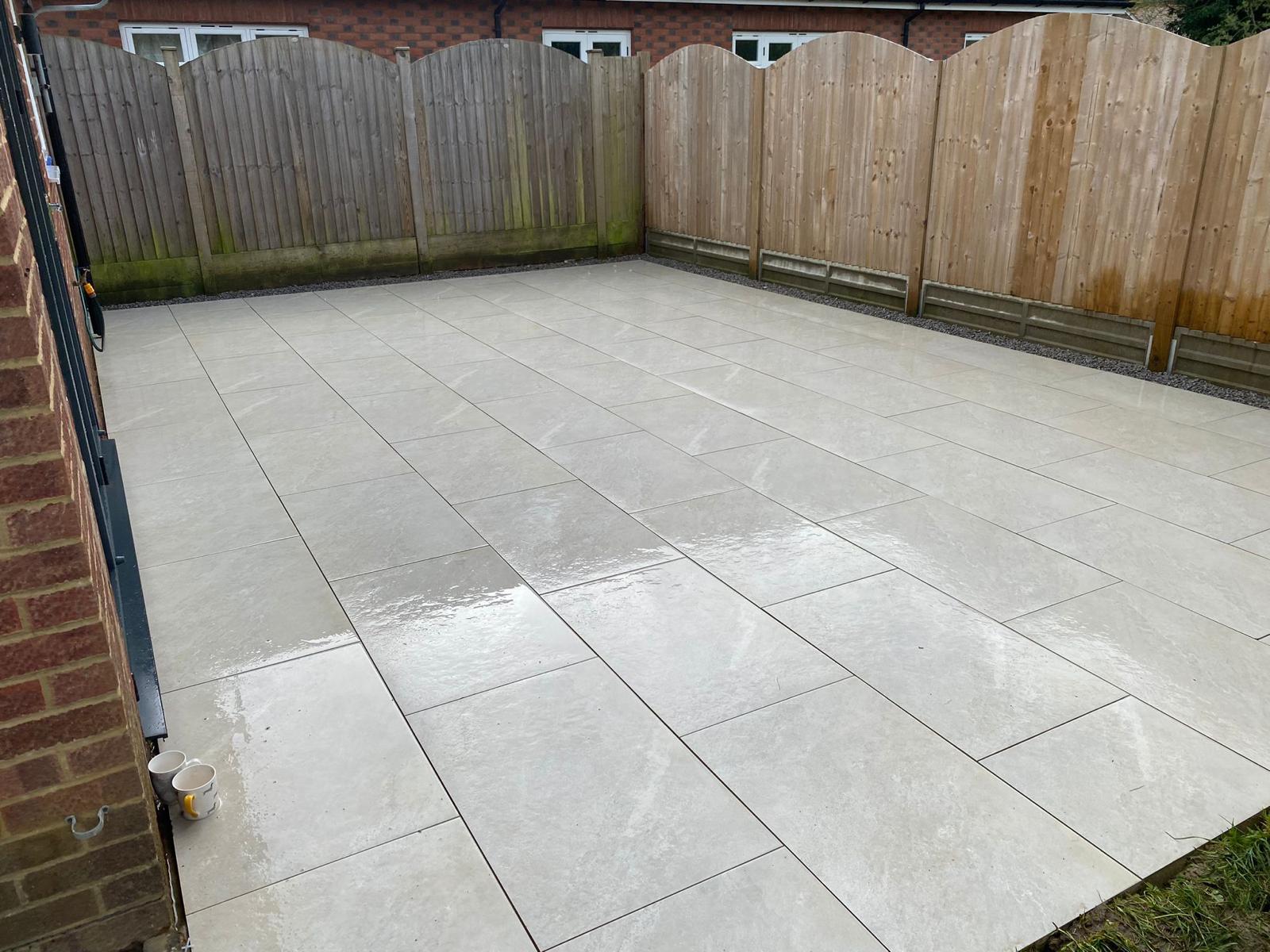 White porcelain patio in a well-kept garden