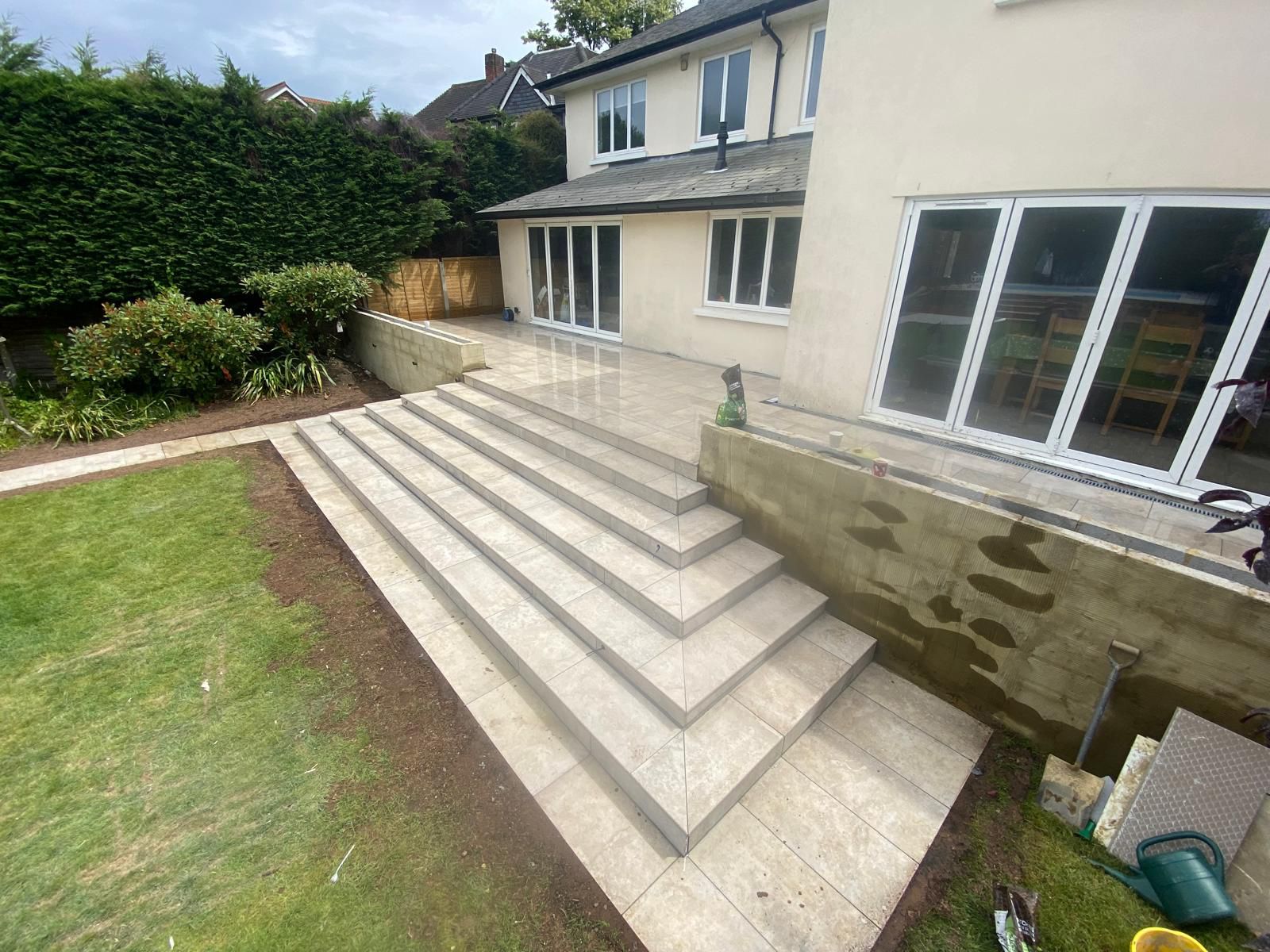 Wide porcelain steps leading to house entrance