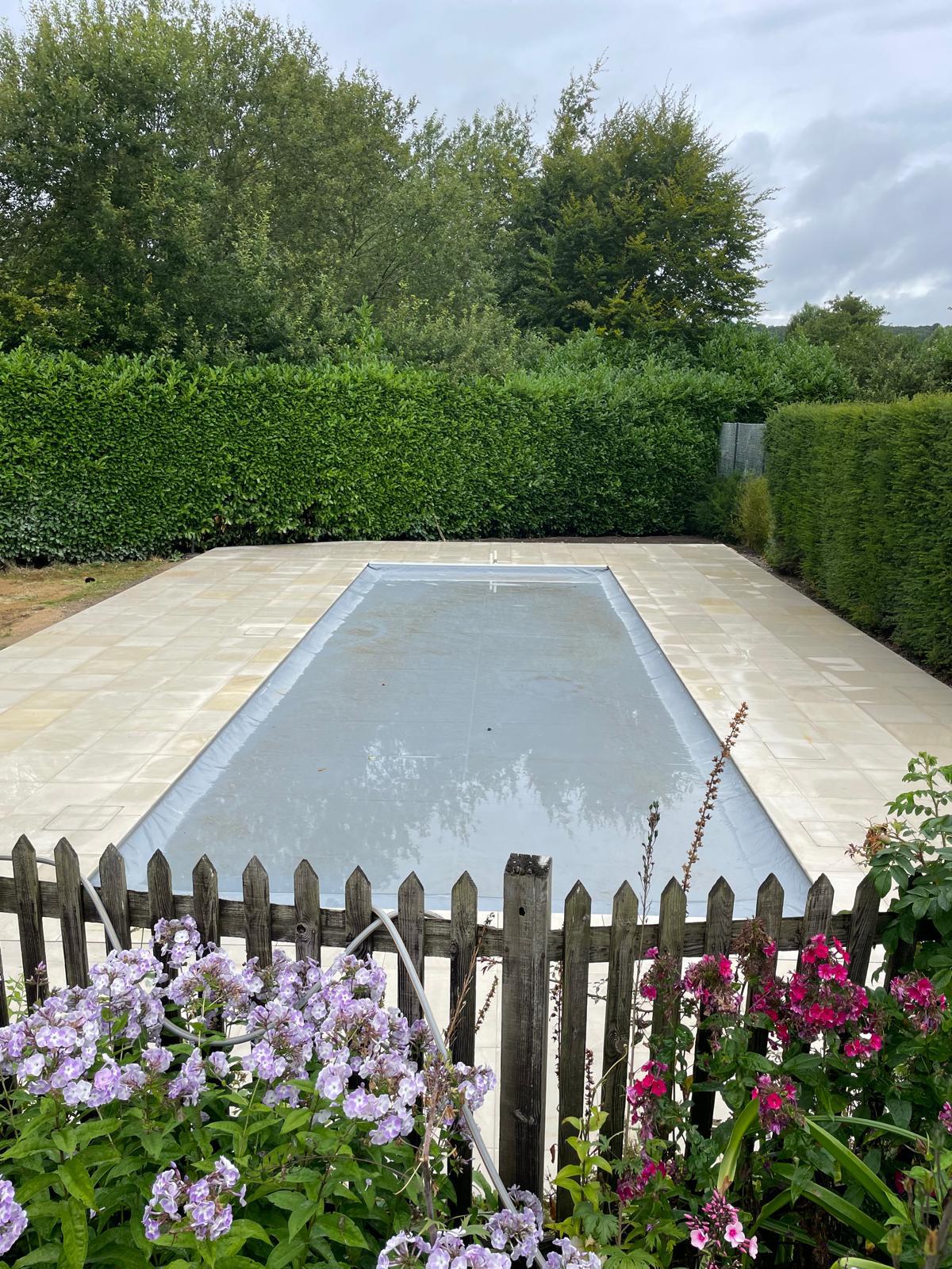 Pool surround with flowers – alternate view