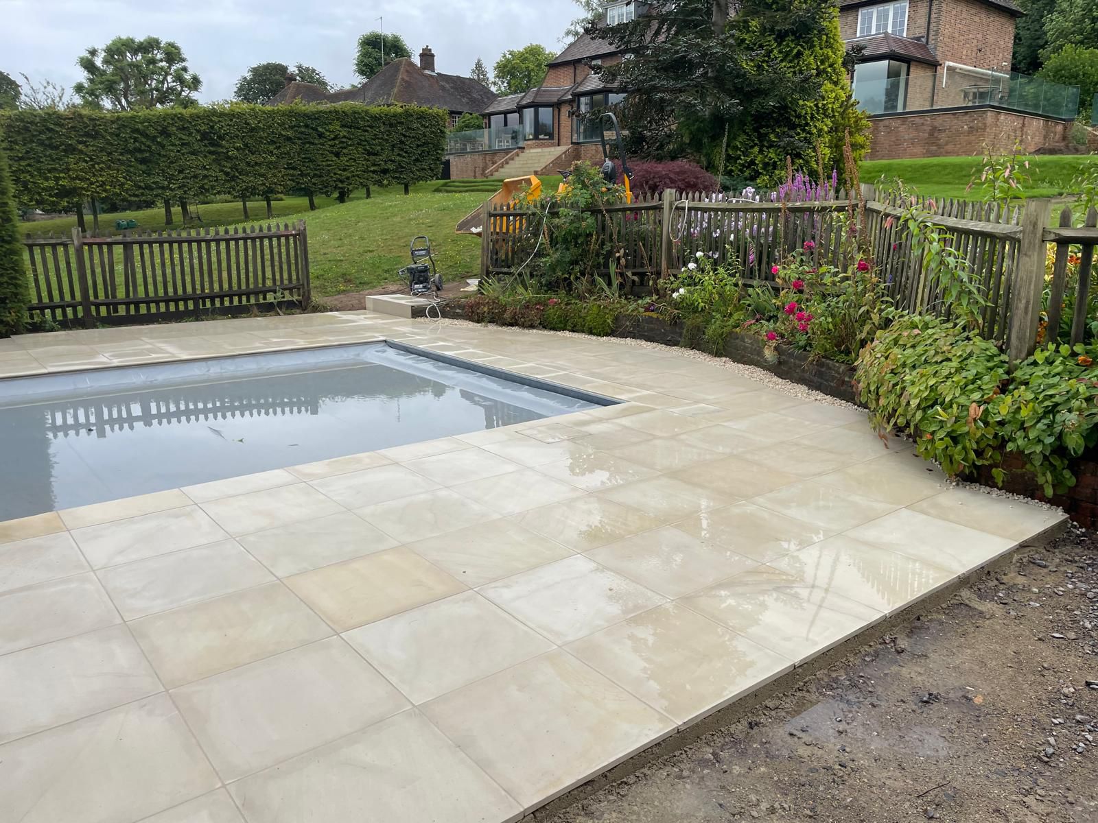 Pool surround with garden view