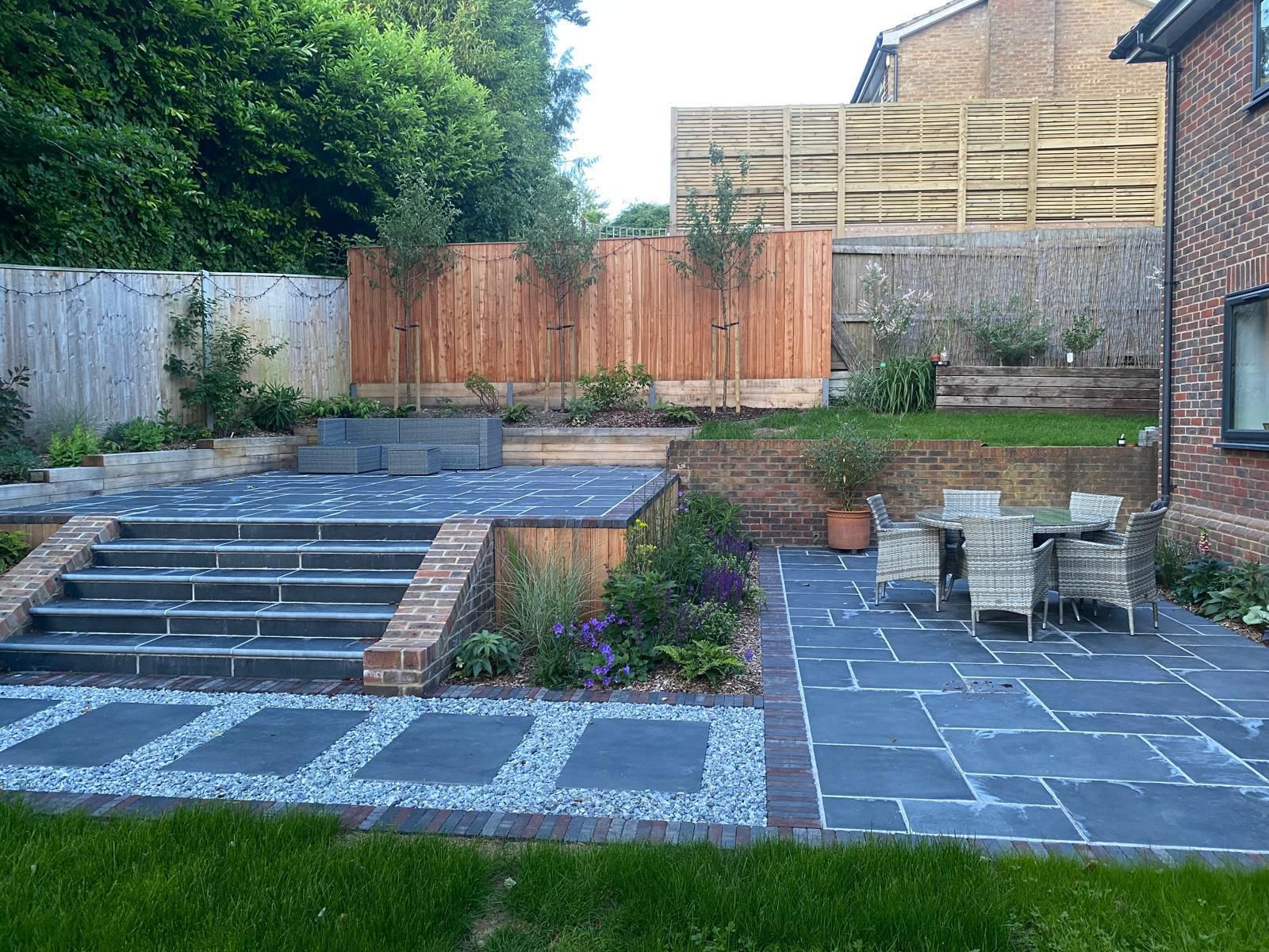 Porcelain patio and cedar-clad garden room